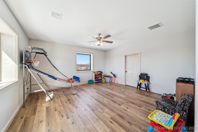9501 S 4170th Rd, Claremore, OK 74017 - recreation room featuring wood finished floors, baseboards, and a ceiling fan