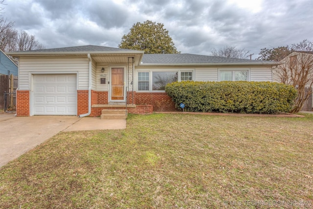 ranch-style home with a front lawn and a garage