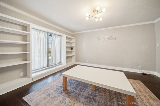 office space with crown molding, dark wood-type flooring, a textured ceiling, and a chandelier