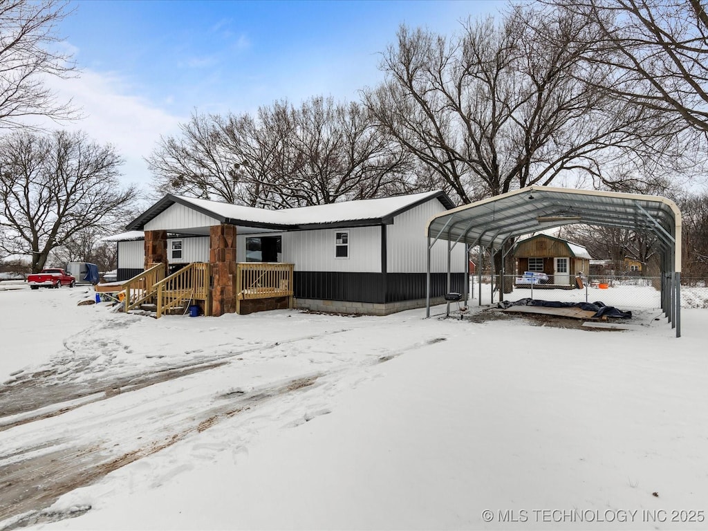 exterior space featuring a carport