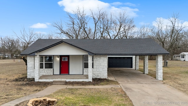 view of front of property with a porch, a garage, and a carport