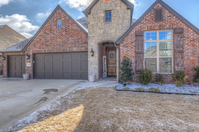 view of front of property with a garage