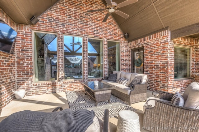 view of patio featuring outdoor lounge area and ceiling fan