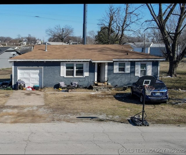 ranch-style house with a garage