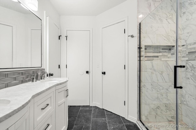 bathroom with vanity and walk in shower