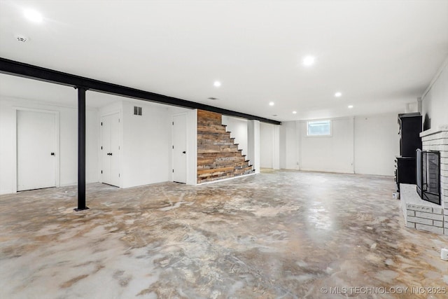 basement with a fireplace