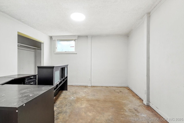 interior space with a textured ceiling