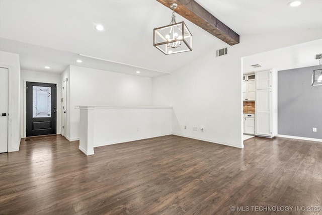 interior space featuring lofted ceiling with beams, a notable chandelier, and dark hardwood / wood-style flooring