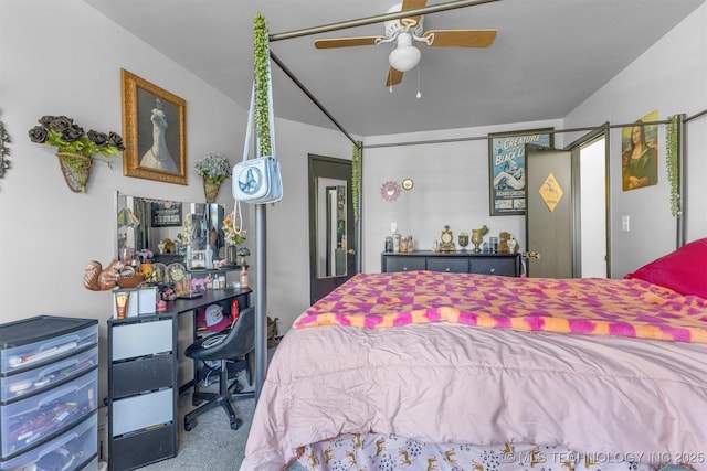 bedroom featuring vaulted ceiling and carpet flooring