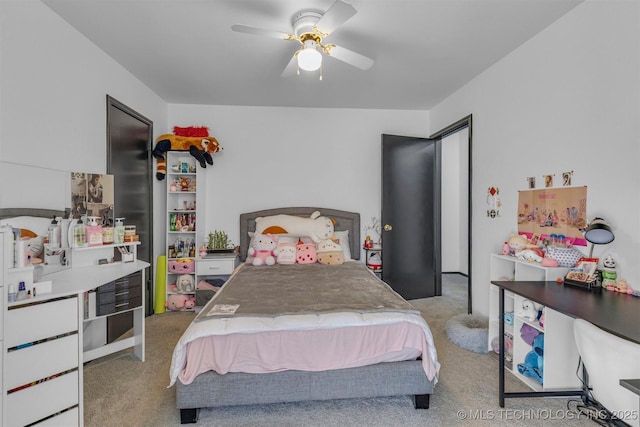 carpeted bedroom with ceiling fan