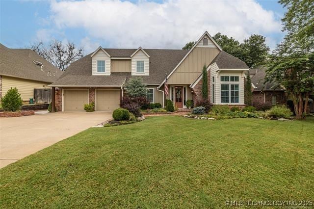 view of front of home featuring a garage and a front yard