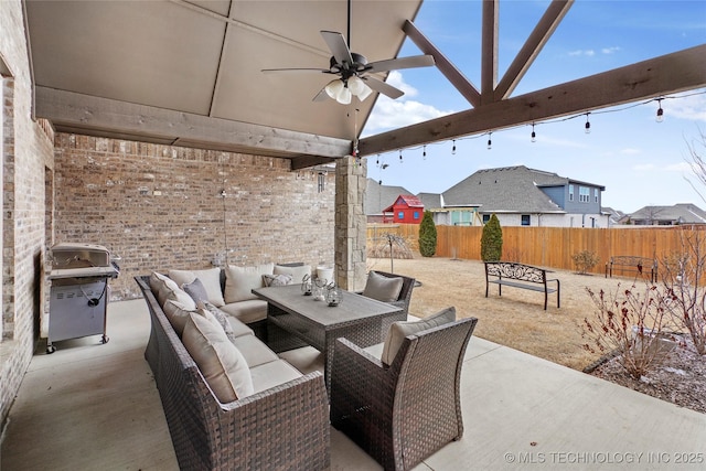 view of patio featuring area for grilling, outdoor lounge area, and ceiling fan