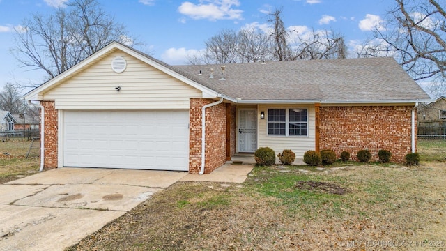 ranch-style home with a garage and a front yard