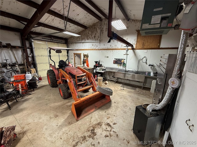 garage with a workshop area