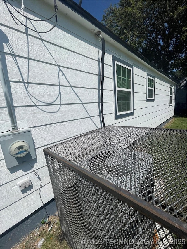 exterior details featuring electric meter