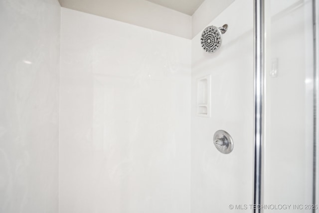 bathroom with a shower