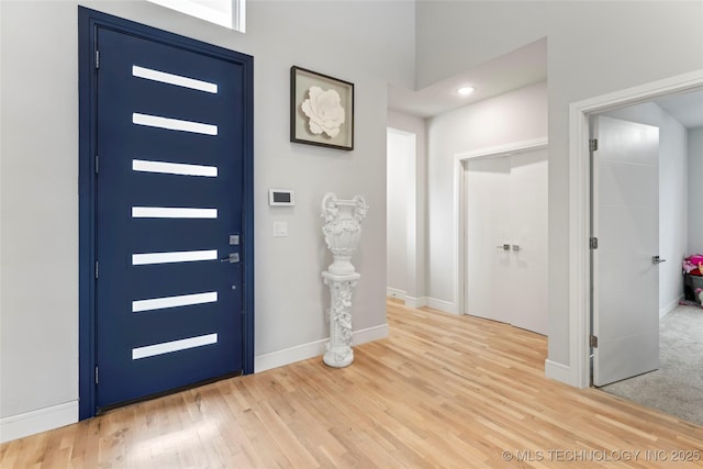 entryway with wood-type flooring