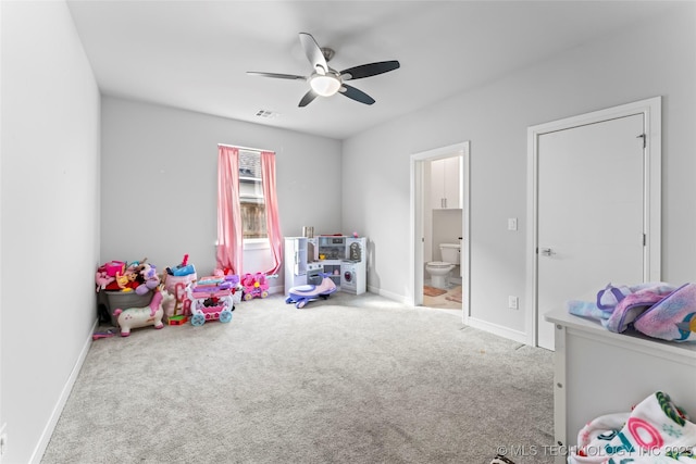 rec room with ceiling fan and carpet floors