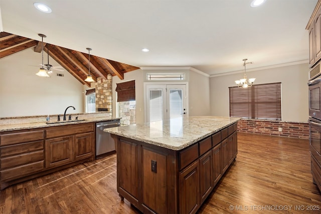 kitchen with sink, decorative light fixtures, a center island, lofted ceiling with beams, and stainless steel dishwasher