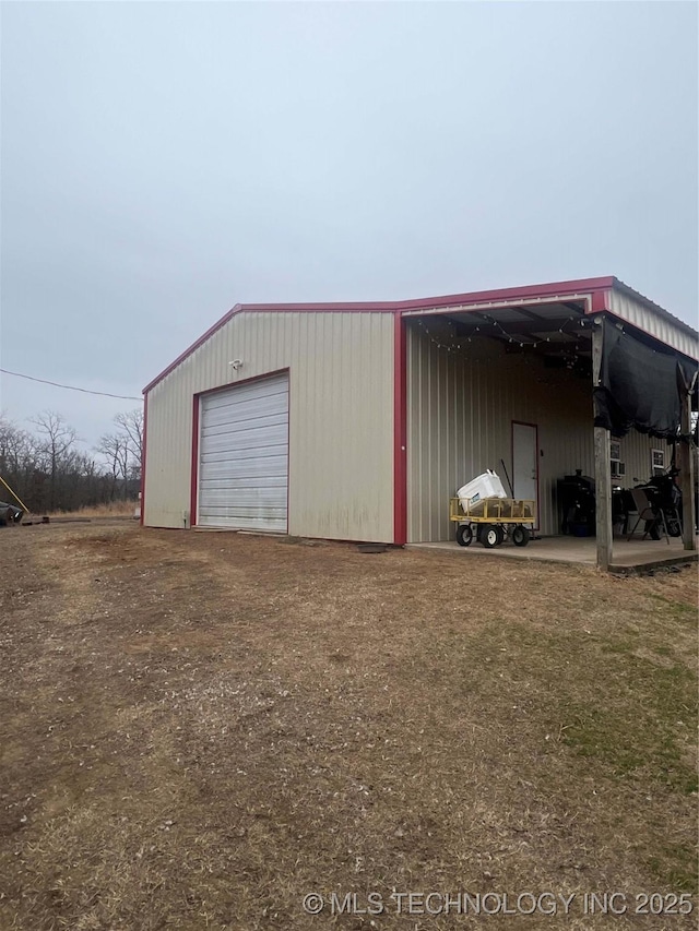 view of outdoor structure with a garage