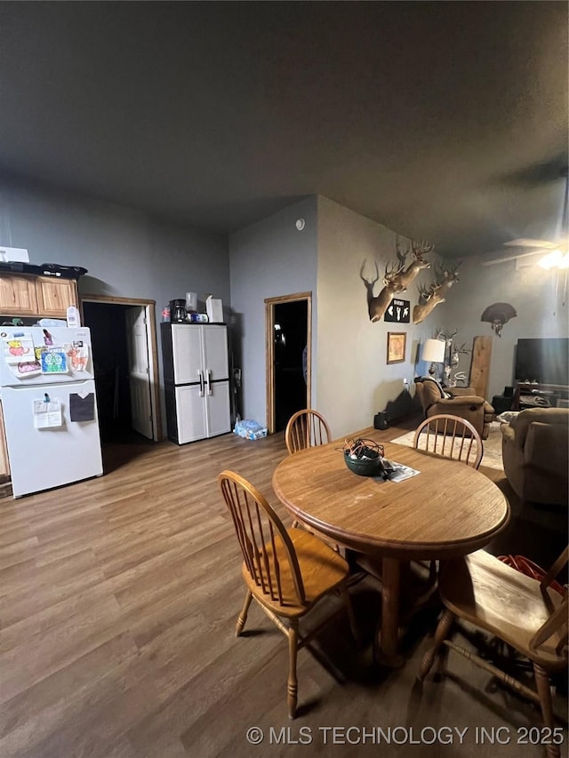 dining area with light wood-type flooring