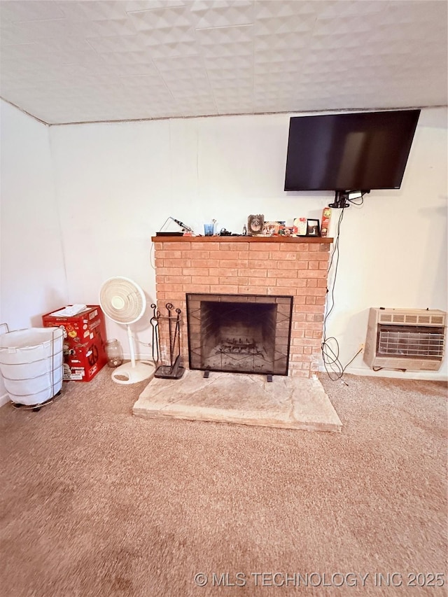 2420 3rd NE, Ardmore, OK 73401 - detailed view of carpet flooring, a brick fireplace, and an AC wall unit