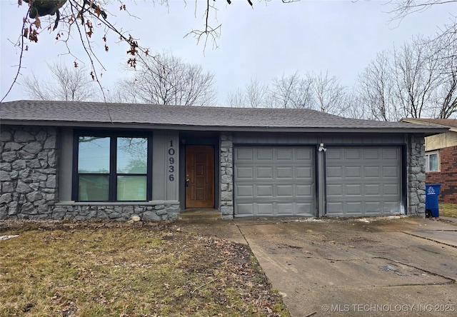 single story home featuring a garage