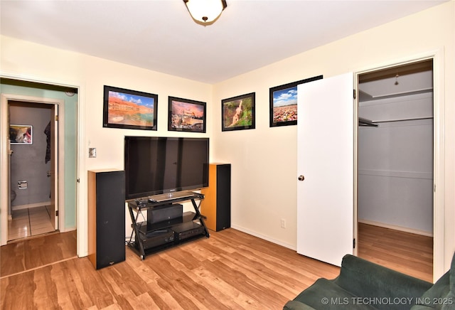 interior space featuring a closet and light hardwood / wood-style flooring