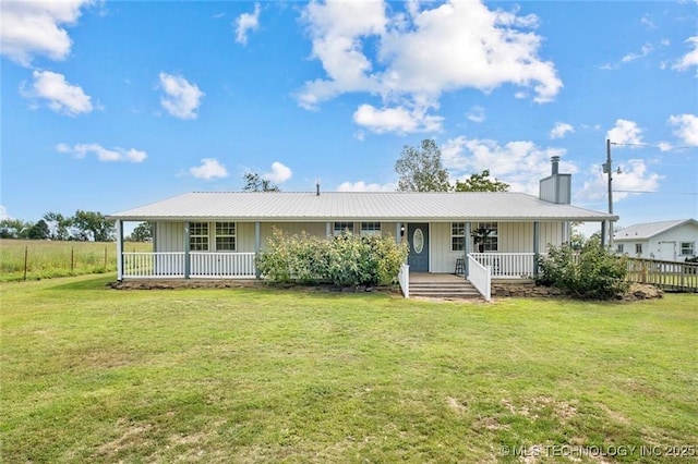 view of front of house with a front lawn and covered porch