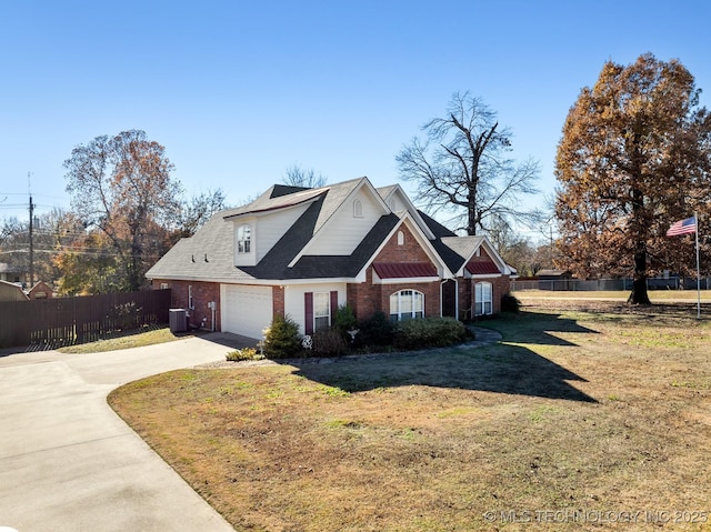 view of front of house with a front yard and central air condition unit