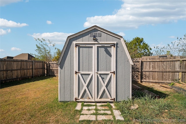 view of outdoor structure with a yard