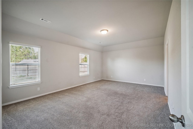 view of carpeted spare room