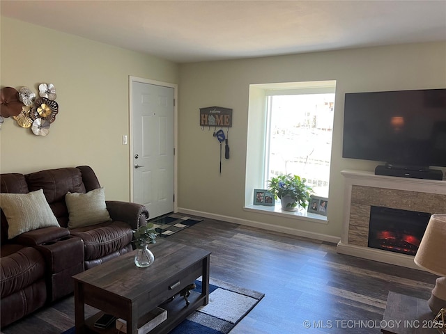 living room with dark hardwood / wood-style flooring