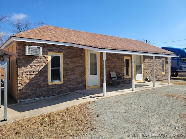 back of house with a patio area