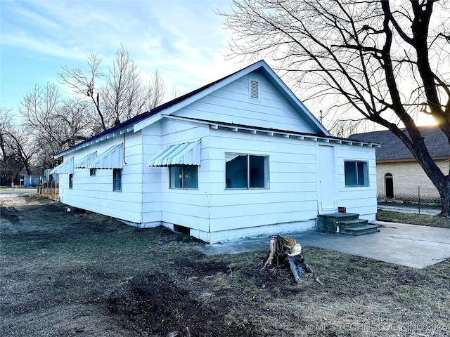 rear view of house with a patio area