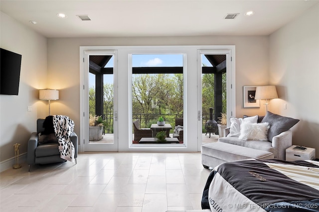 bedroom with access to outside, visible vents, and recessed lighting