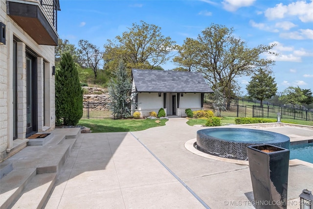 view of swimming pool with a fenced in pool, an exterior structure, a fenced backyard, and an outdoor structure