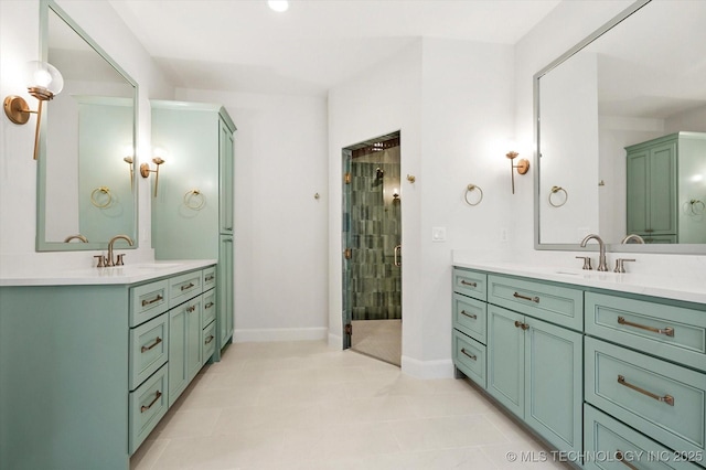 bathroom featuring vanity and a shower with shower door