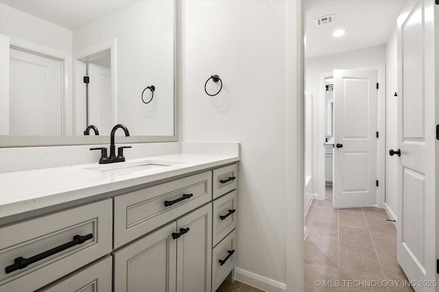 bathroom featuring vanity and tile patterned floors