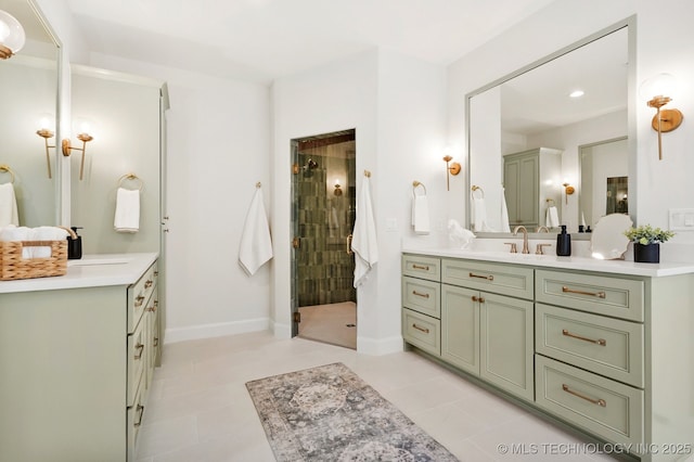 bathroom featuring vanity, an enclosed shower, and tile patterned floors