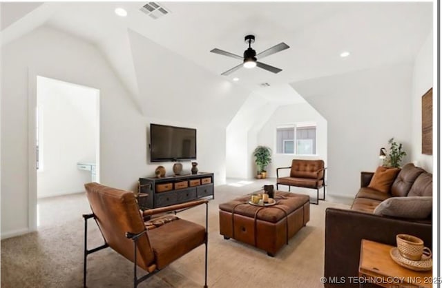 living room with lofted ceiling, light colored carpet, and ceiling fan