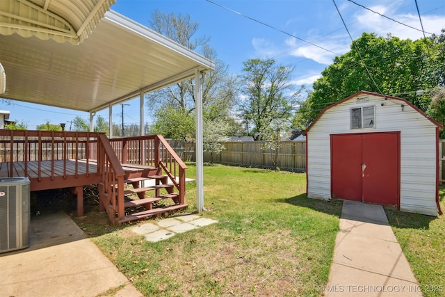 3006 E 21st St, Tulsa, OK 74114 - fenced backyard with a storage unit and a wooden deck