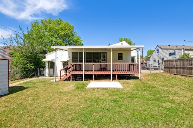 3006 E 21st St, Tulsa, OK 74114 - back of property featuring a fenced backyard and a deck