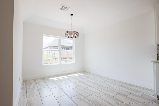 2044 E 129th Pl S, Jenks, OK 74037 - unfurnished dining area featuring a chandelier and baseboards