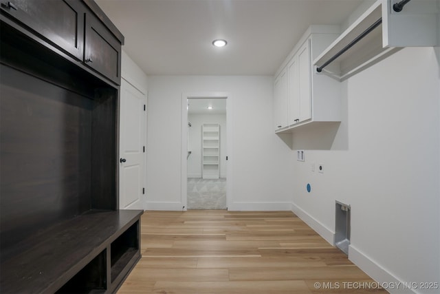 2044 E 129th Pl S, Jenks, OK 74037 - laundry room featuring hookup for an electric dryer, light wood-type flooring, baseboards, recessed lighting, and cabinet space
