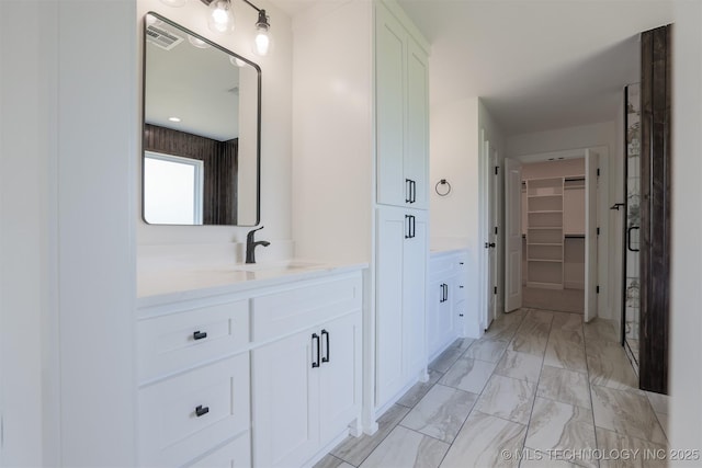 2044 E 129th Pl S, Jenks, OK 74037 - full bath with vanity, marble look tiles, and a spacious closet