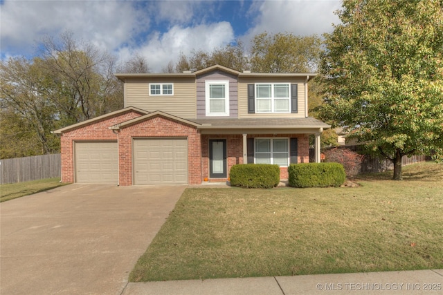 view of front of home featuring a garage, concrete driveway, fence, a front lawn, and brick siding