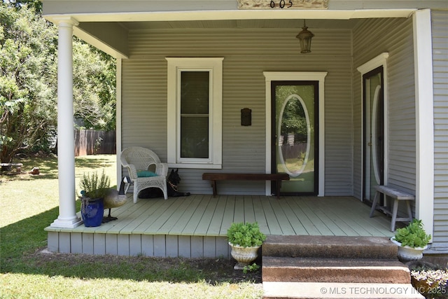 doorway to property with covered porch