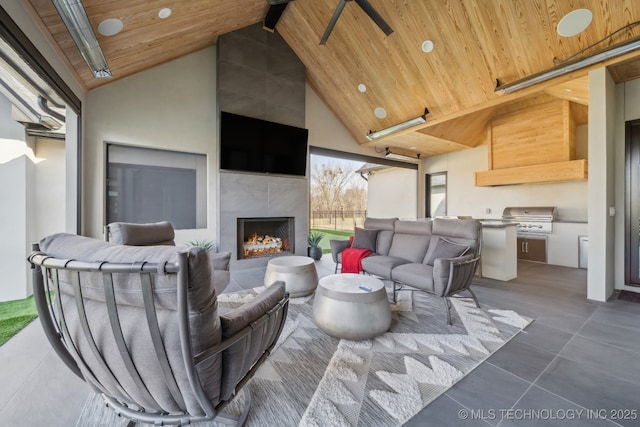 7300 E College St, Broken Arrow, OK 74014 - tiled living area with a fireplace, wooden ceiling, and high vaulted ceiling