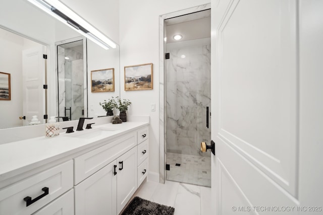7300 E College St, Broken Arrow, OK 74014 - bathroom featuring marble finish flooring, vanity, a marble finish shower, and recessed lighting